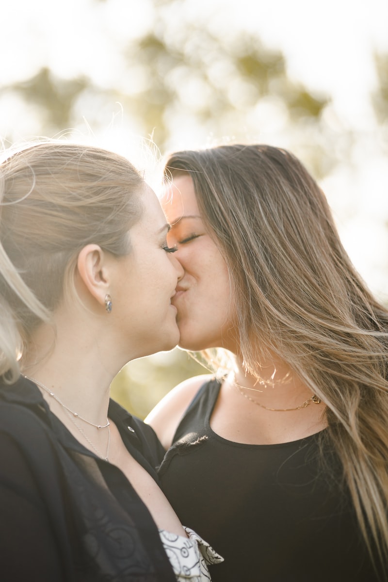 woman kissing womans cheek When Dating Gets... Easy!